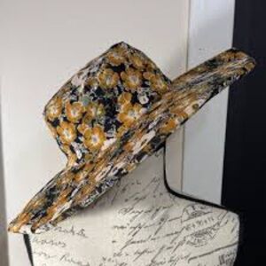 Anthropologie Black and Gold Patterned Hat